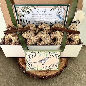 10 premium bird seed cakes (optional 2 ribbon twig feeders- for an extra dollar) An easy way to feed your feathered friends! Card opt.