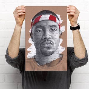 May include: A black and white drawing of a man wearing a red and white bandana. The drawing is on a brown background with white text.