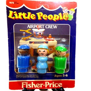 May include: Vintage Fisher-Price Little People Airport Crew playset. The packaging is blue, red, and yellow, with the words "Little People" and "Airport Crew" displayed. The set includes three Little People figures and an airport playset.