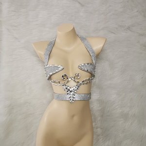 A on X: this metal hand bra is sexy  / X