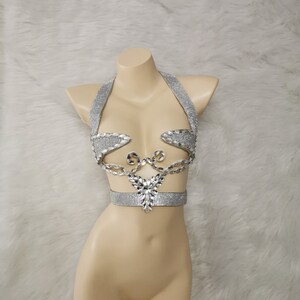 A on X: this metal hand bra is sexy  / X