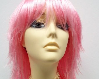 Image of Pastel pink shag with blunt bangs