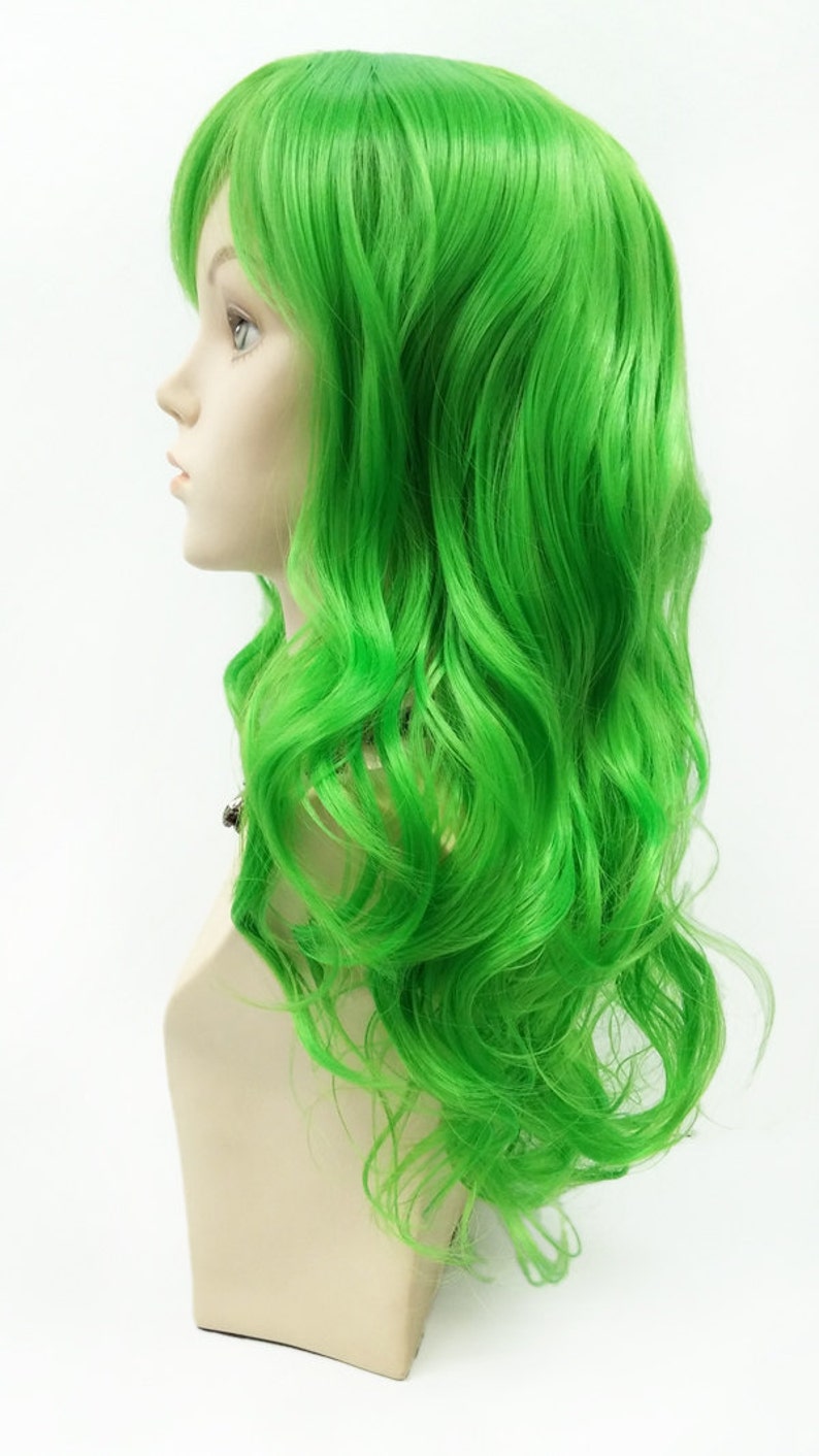 May include: A long, bright green wig with loose, wavy curls. The wig is styled with a side part and falls to the shoulders.