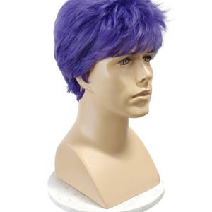 May include: A set of three ceramic mugs with a speckled, matte finish. The mugs are in shades of cream, light gray, and dark gray. Each mug has a simple, minimalist design, perfect for coffee or tea.