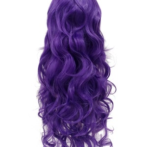May include: A long, purple wig with loose, wavy curls. The wig is styled on a mannequin head.