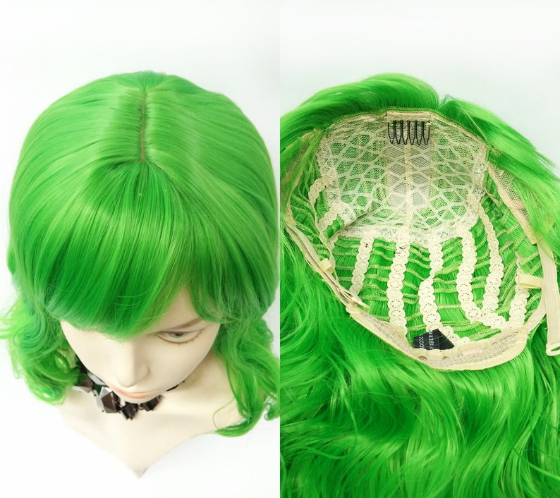 May include: A bright green wig with long, wavy hair and a side part. The wig has a lace front and adjustable straps.