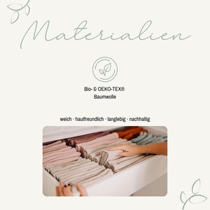 May include: A graphic featuring the text Materialien, Bio- & OEKO-TEX Baumwolle, and weich, hautfreundlich, langlebig, nachhaltig. Below, a photograph shows a drawer filled with neatly folded stacks of fabric in various muted colors.