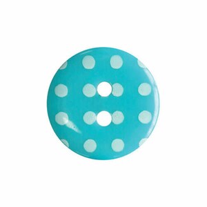 May include: A turquoise button with white polka dots. The button has two holes.