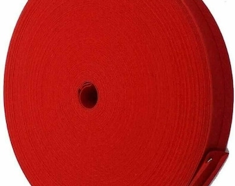 May include: A roll of bright red elastic fabric.