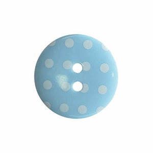 May include: A pale blue button featuring white polka dots. The button has two holes and a glossy finish. This round button is a sewing or craft supply.