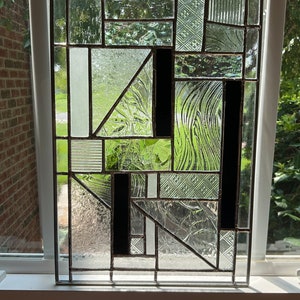 Geometric Stained Glass Panel With Black Accents