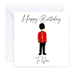 May include: A square white greeting card featuring a black-and-white illustration of a British royal guard in a red tunic, black trousers, and a tall black bearskin hat. The text "Happy Birthday" appears above the guard and "To You" below.