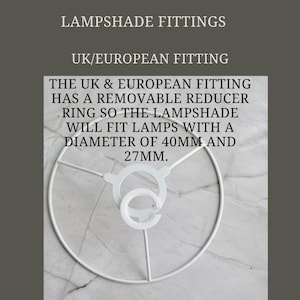 May include: White metal lampshade fitting for UK and European lamps. The fitting has a removable reducer ring that fits lamps with a diameter of 40mm and 27mm.