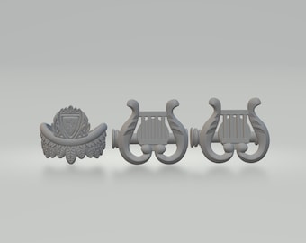 May include: Three decorative metal curtain tiebacks. The tiebacks are in the shape of a lyre, a musical instrument. The tiebacks are gray in color.