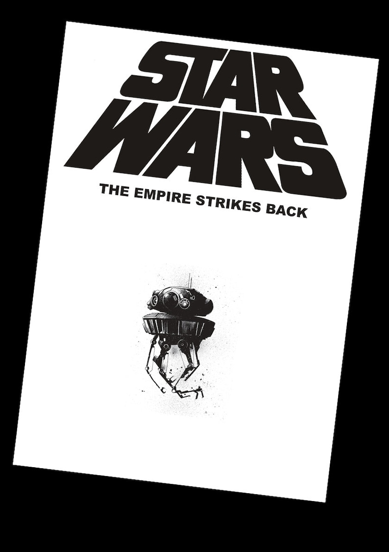 May include: Black and white illustration of the Star Wars logo with the text "The Empire Strikes Back" below it. A black and white illustration of a probe droid is below the text.