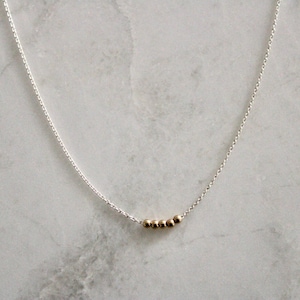 Two tone sterling silver chain and tiny gold filled bead necklace, dainty mixed metals jewelry