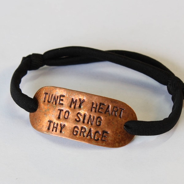 Rustic Hand Stamped Copper Bracelet with Black Nylon Band - "Tune My Heart To Sing Thy Grace"