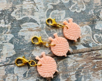 yarn and needle stitch markers