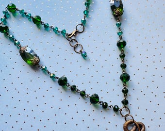 Green Beaded Necklace with Bronze Snake Pendant
