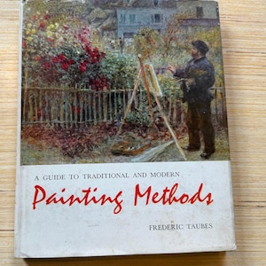 May include: A vintage book titled "Painting Methods" by Frederic Taubes. The cover features a painting of an artist at work outdoors, with a garden and house in the background. The title is in red script.