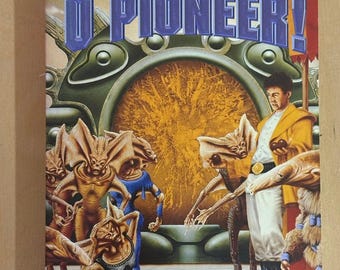 May include: Book cover for "O Pioneer!" by Frederik Pohl. The cover features a science fiction scene with alien figures and a man in a yellow jacket. The title is in large, blue letters. The cover also includes a quote from Kirkus Reviews.