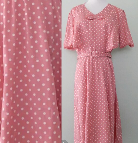 pink dress with white polka dots