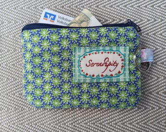 Pequeña bolsa/cartera para guardar objetos diversos