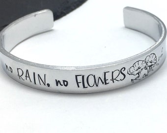 Personalised cuff bracelet hand stamped with inspirational quote, customised open bangle, no rain no flowers, hypoallergenic jewellery