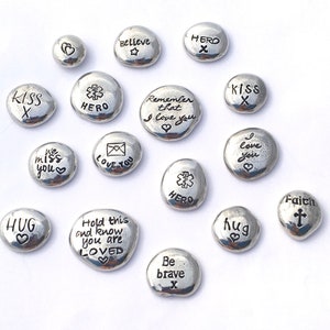 Pewter pocket pebble with personalised message, send a hug token, customise your own gift and send directly to the recipient.