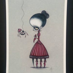 May include: A black and white illustration of a girl in a red and white striped dress with a spider dangling from a string above her head.
