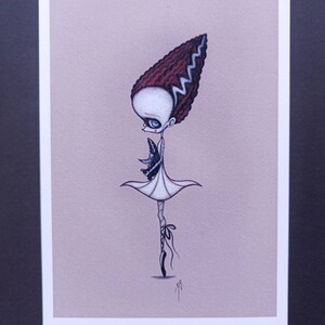 May include: A whimsical illustration of a ballerina with a green and black monster in her arms. She has a red and white hairdo with a lightning bolt pattern. The ballerina is wearing a white tutu and black shoes. The background is a light pink.