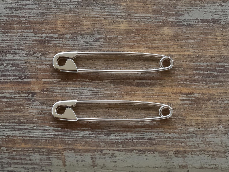 This is a pair of Safety Pin Earrings made from sterling silver.
These safety pins are 3.1cm long and weighs 1 gram.
Here is some details of the item:
Sterling Silver-Glossy finish-Hand made-925 Stamped