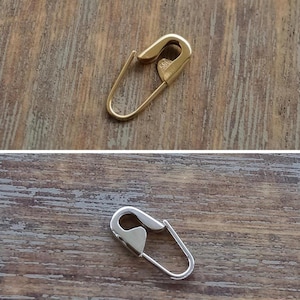 Pendientes de color plateado con imperdible de 1/2''