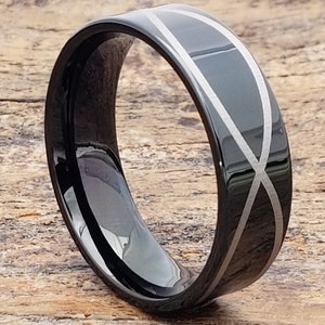 May include: A black tungsten carbide ring with a silver infinity symbol design.