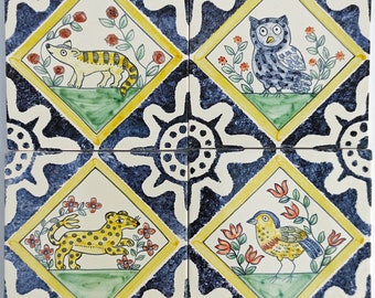 Four handmade handpainted tiles