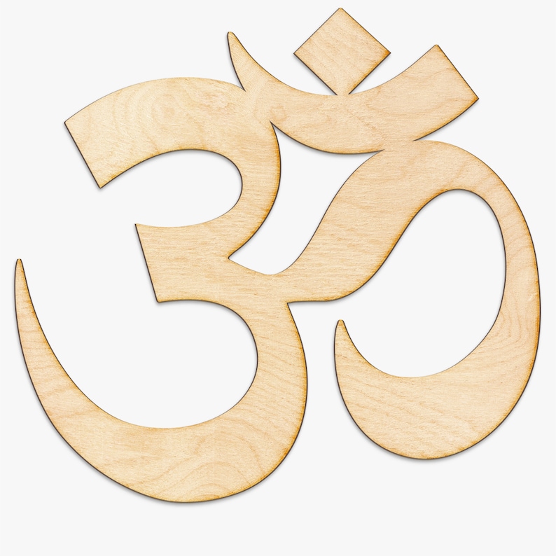 May include: A wooden cutout of the Om symbol, a sacred sound and symbol in Hinduism and Buddhism.