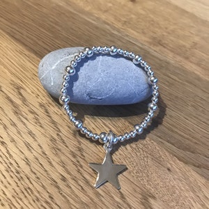 Pulsera del encanto de la estrella de plata