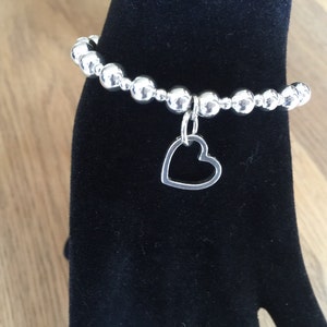 Sterling Silver Bead Bracelet with outline heart charm