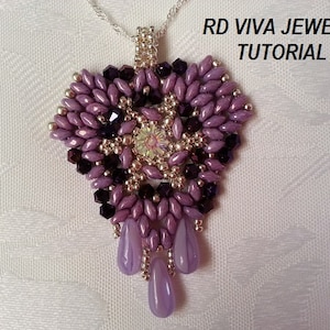 May include: A purple and silver beaded heart pendant with a crystal center and dangling beads. RD Viva Jewelry Tutorial.