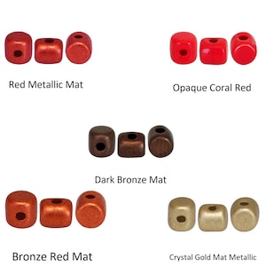 May include: Three rows of six square beads in different colors and finishes. The top row shows red metallic matte beads, the middle row shows dark bronze matte beads, the bottom row shows bronze red matte beads, and the last row shows crystal gold matte metallic beads.