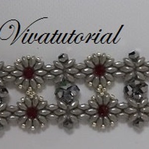 May include: A silver and red beaded bracelet with a flower design. The bracelet is made with small seed beads and has a silver clasp.