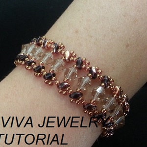 May include: A multi-strand bracelet with clear faceted beads, copper-colored beads, and dark purple beads. The bracelet is on a person's wrist. The text "RD VIVA JEWELRY TUTORIAL" is at the bottom of the image.