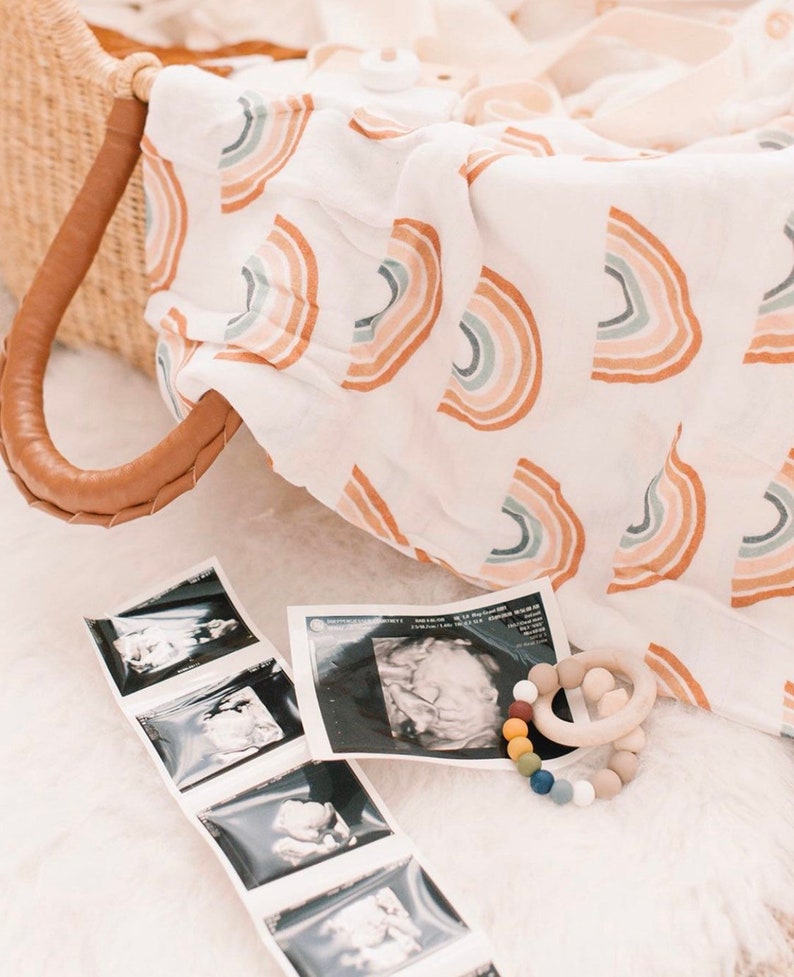 Rainbow feather print Muslin Swaddle
