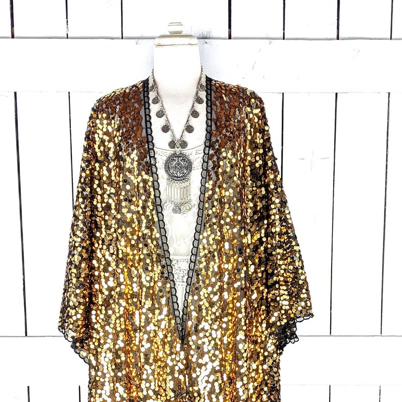 QUILTED ZIP UP JACKET WITH SEQUIN DETAIL