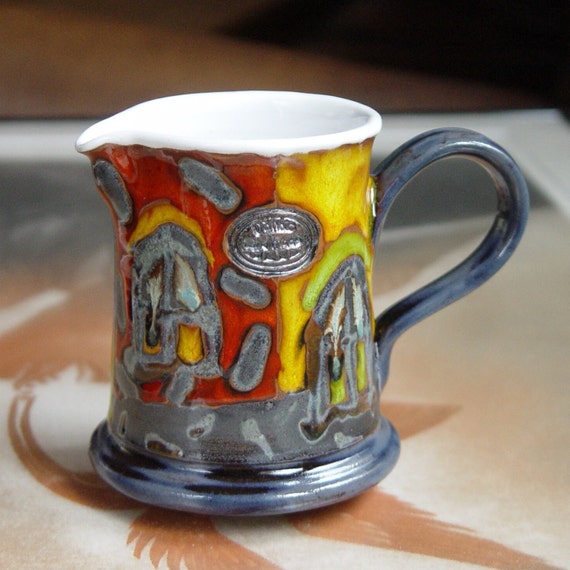 Hand-Glazed 10 oz Colorful Pottery Milk Jug: Radiant Orange and Red and Tranquil Blue - Perfect Gift Idea!