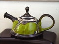 Christmas Gift - Wheel Thrown Green Pottery Teapot | Unique Ceramic Art | Family Gift | Glossy & Matte Finish | Handmade in Bulgaria product logo