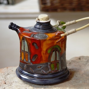 Unique Colorful Clay Pitcher with Natural Wicker Handle image 1