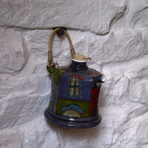 Unique Colorful Clay Pitcher with Natural Wicker Handle image 3