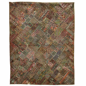 May include: A large, colorful patchwork quilt with a geometric pattern. The quilt is made up of many different fabrics, including silk, cotton, and velvet. The quilt is decorated with beads, sequins, and embroidery.