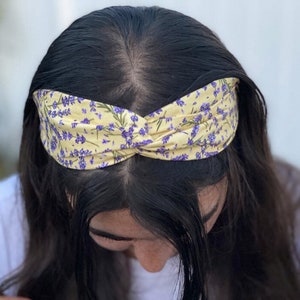 Floral gedraaide knoop hoofdband